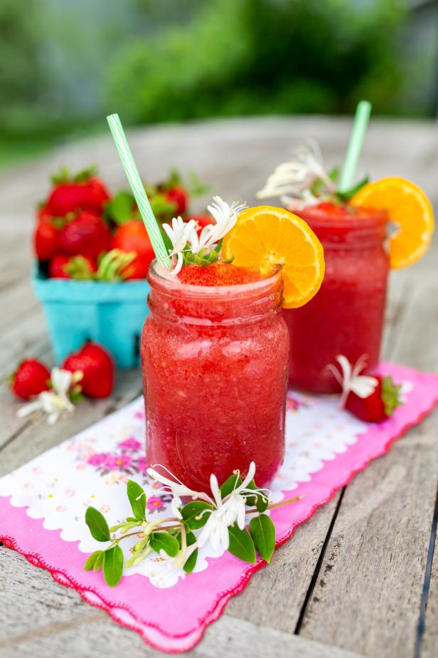 Bright, crisp honeysuckle vodka pairs with sweet summer strawberries in this refreshing grown-up slushie.  