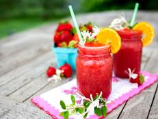 Lay back, relax and beat the scorching summer heat with a grown-up slushie that combines two of the season's most iconic flavors: strawberry and honeysuckle (vodka, that is).
