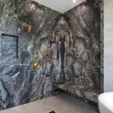 Gray Marble Walk In Shower With Gold Fixtures