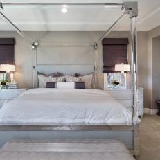Purple Bedroom With Mirrored Dresser