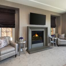Gray Fireplace and Armchairs