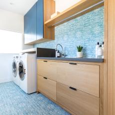Blue Laundry Room With Graphic Tiles