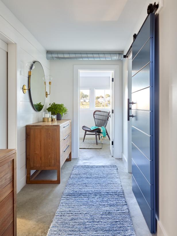 Hallway with Concrete Floor and Exposed Pipe