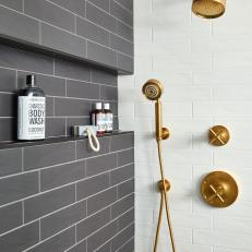 Black and White Tile Shower with Satin Brass Fixtures