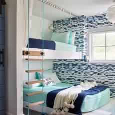 Watery Bunk Room with Turquoise Rope Ladders and Wavy Wallpaper