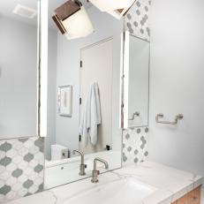 Gray and White Bathroom With Pendant