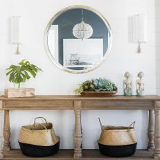 Cool Neutral Entryway With Sconces 