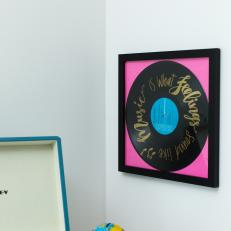 A Vinyl Record is Repurposed as Artwork in a Frame