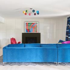 Contemporary Game Room with Blue Sectional