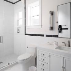 White Bathroom With Black Tile Trim
