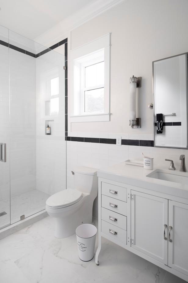 White Bathroom With Black Tile Trim | HGTV