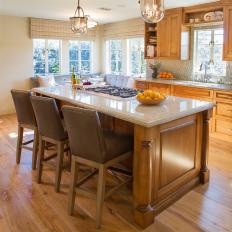 Neutral Open Plan Kitchen With Leather Barstools