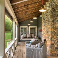 Side Porch Features a Natural Stone Fireplace