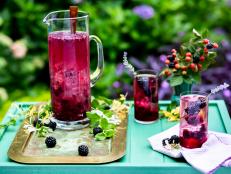 Pair juicy, garden-fresh blackberries with sweet honeysuckle vodka for a colorful cocktail that tastes like summer in a glass.