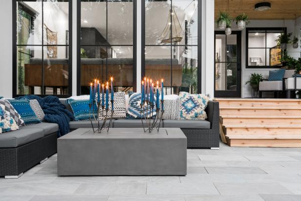 Outdoor Patio With L-Shaped Sectional Sofa and Coffee Table