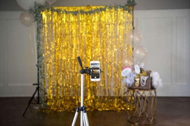 tripod in front of wedding photo booth