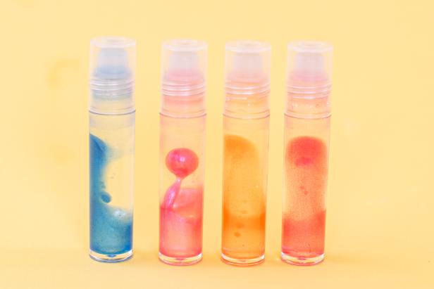 Combine vegetable glycerine, castor oil, and colorful edible mica powder to make the grooviest lip gloss.