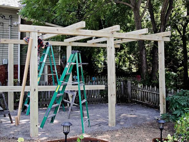 Add 4x6x12 rafters by placing them, evenly spaced, on top of the structure — they will have a 12” overhang.