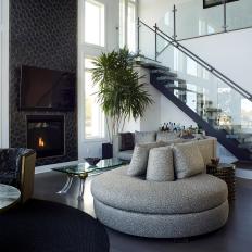 Open Concept Living Space With Serpentine Sofa