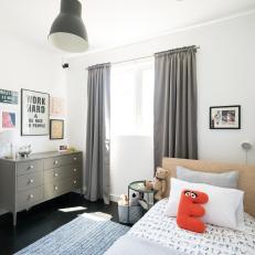 Blue and Gray Boys Bedroom With Red E
