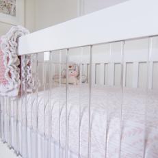 Pink and White Nursery With Acrylic Crib