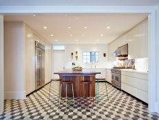 Geometric Floor Tiles And Walnut Kitchen Island In Midcentury Space