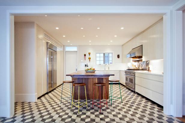 Geometric Floor Tiles And Walnut Kitchen Island In Midcentury Space