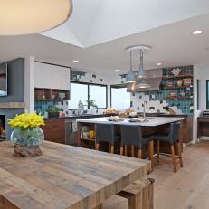 Coastal Open Plan Kitchen and Dining Area With Yellow Flowers