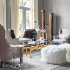 Gray Living Room With Furry White Stools