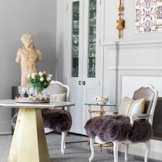 Eclectic Sitting Area With Purple Furry Chairs