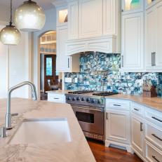 White Kitchen With Blue Backsplash