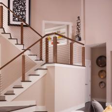 Modern Staircase With Soft Pink Walls