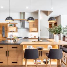 Scandinavian Open Plan Kitchen With Black Barstools