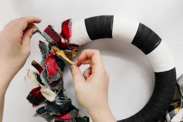 Use a double knot to tie each strip onto the wreath.