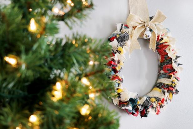 Make this charming, rustic wreath out of a simple blanket scarf.