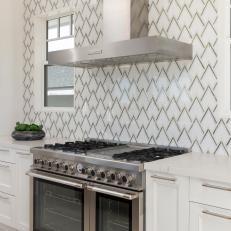 Modern Kitchen With Counter-To-Ceiling Tile Backsplash