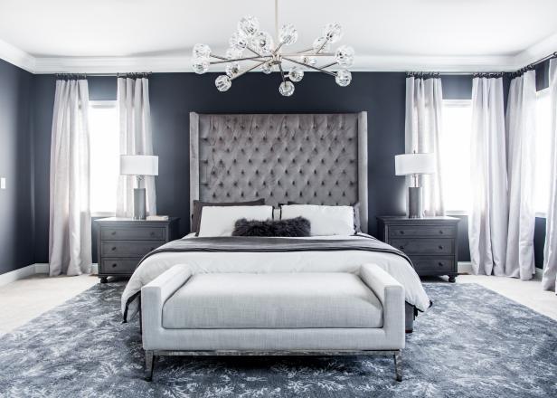 Modern Bedroom With Dark Walls, Light Ceilings And Plush Textures