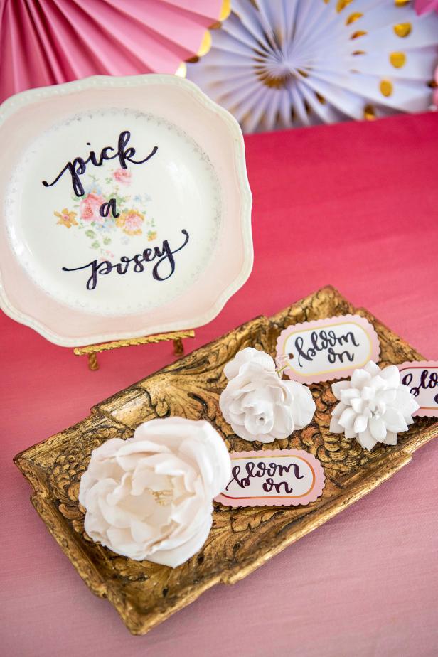Dip inexpensive faux flowers and succulents into plaster to create delicate mini sculptures that look like pricey porcelain. Perfect as wedding favors or as a one-of-a-kind gift topper or place card.