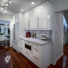 Sleek Modern Kitchen With Glossy White Cabinets