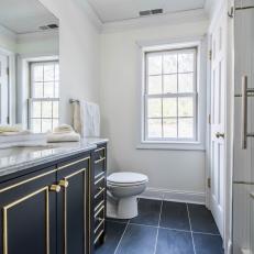 Black and White Master Bathroom With Black Floor