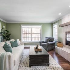  Green Transitional Living Room With Limestone Fireplace