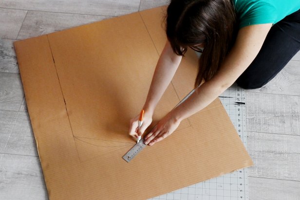 Refine your fireplace shape with a ruler and pencil, and cut out with a craft knife.