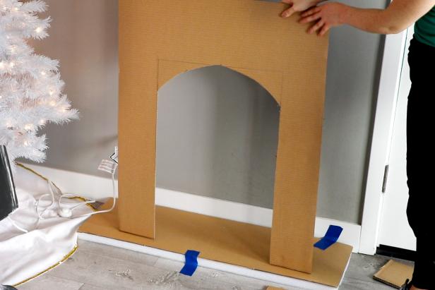 Refine your fireplace shape with a ruler and pencil, and cut out with a craft knife.