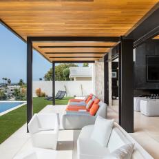 Modern Covered Patio With Exposed Wood Ceiling