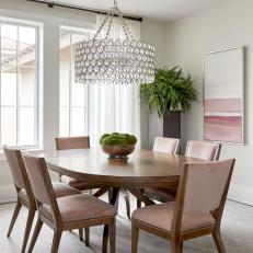 Pink Transitional Dining Room With Moss Centerpiece
