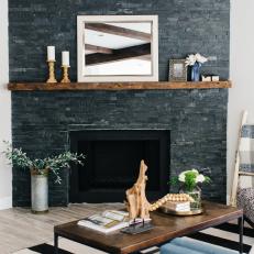 Living Room With Dark Charcoal Fireplace