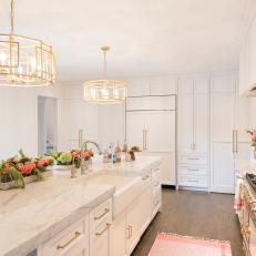White Open Plan Kitchen With Pink Flowers