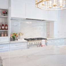 White Chef Kitchen With Open Cabinet