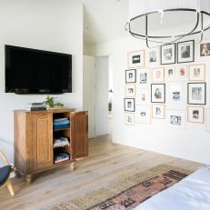 Transitional Bedroom With Framed Art Gallery Wall