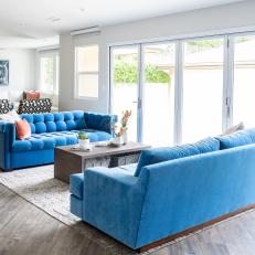 Great Room With Blue Velvet Sofas
